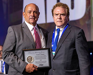Tom Toner (left) presented the Tadeusz Sendzimir Memorial Medal for Innovation in Steel Manufacturing Technology to Thaddeus Sendzimir (right), on behalf of Ronald J. O'Malley.
